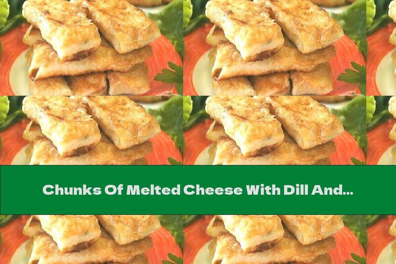 Chunks Of Melted Cheese With Dill And Garlic In Lavash